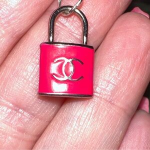 Silver and pink Chanel lock necklace!